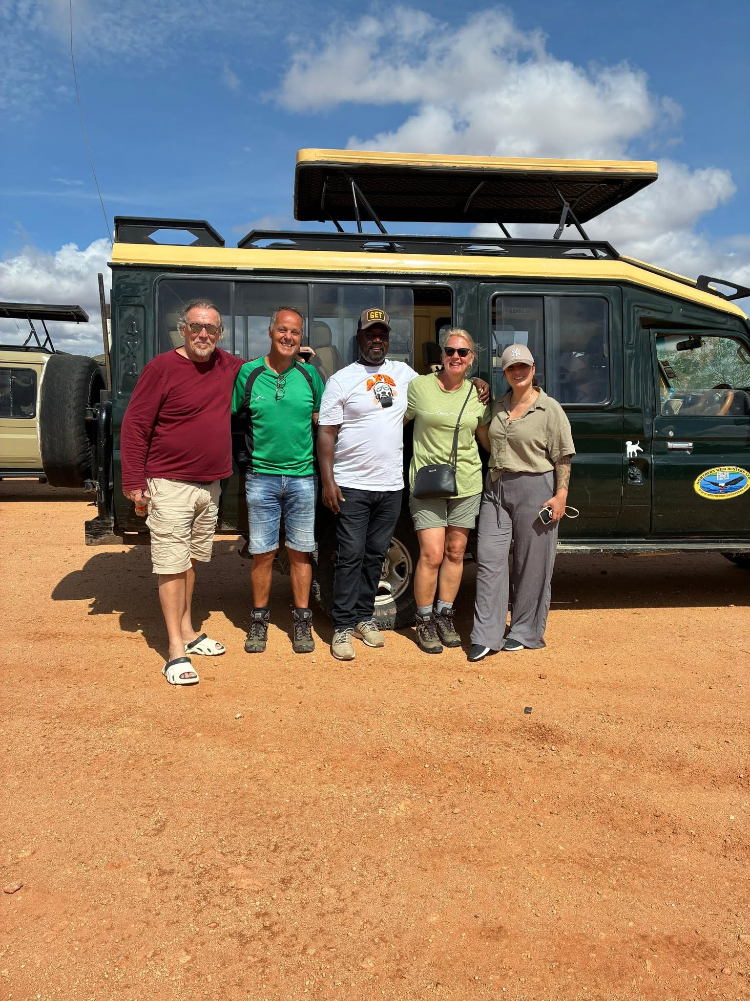 Safari guests with a private safari vehicle